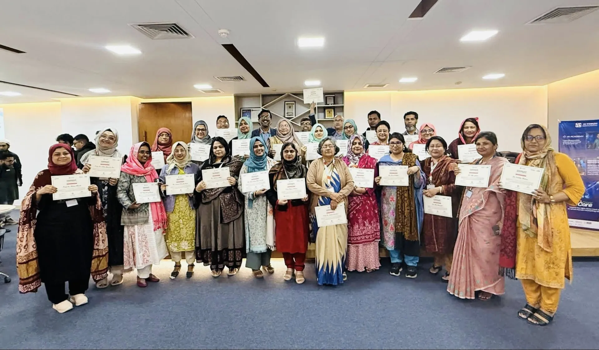Bangladesh Society of Physiologists participants with certificates after an AI Essentials workshop